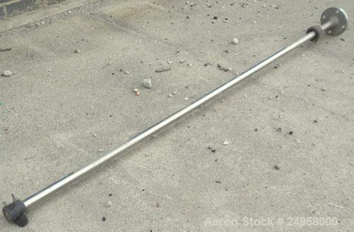 Used Agitator Shaft, 316 Stainless Steel. 1'' Diameter x 62-3/4'' long shaft with a 3'' diameter plastic impeller. 4-3/4'' O.D. (4) 1/2'' diameter hole mounting flange on approximate 2-5/8'' centers