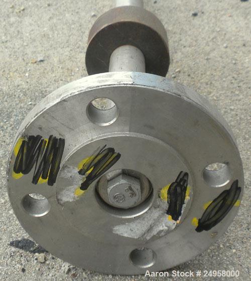 Used Agitator Shaft, 316 Stainless Steel. 1'' Diameter x 62-3/4'' long shaft with a 3'' diameter plastic impeller. 4-3/4'' O.D. (4) 1/2'' diameter hole mounting flange on approximate 2-5/8'' centers