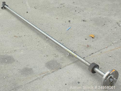 Used Agitator Shaft, 316 Stainless Steel. 1'' Diameter x 62-3/4'' long shaft with a 3'' diameter plastic impeller. 4-3/4'' O.D. (4) 1/2'' diameter hole mounting flange on approximate 2-5/8'' centers