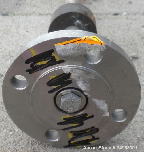 Used Agitator Shaft, 316 Stainless Steel. 1'' Diameter x 62-3/4'' long shaft with a 3'' diameter plastic impeller. 4-3/4'' O.D. (4) 1/2'' diameter hole mounting flange on approximate 2-5/8'' centers