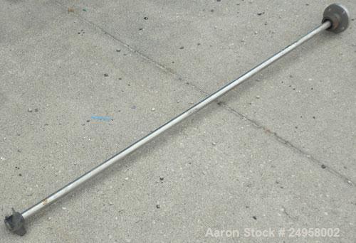 Used Agitator Shaft, 316 Stainless Steel. 1'' Diameter x 62-3/4'' long shaft with a 3'' diameter plastic impeller. 4-3/4'' O.D. (4) 1/2'' diameter hole mounting flange on approximate 2-5/8'' centers