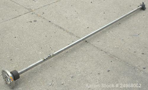 Used Agitator Shaft, 316 Stainless Steel. 1'' Diameter x 62-3/4'' long shaft with a 3'' diameter plastic impeller. 4-3/4'' O.D. (4) 1/2'' diameter hole mounting flange on approximate 2-5/8'' centers