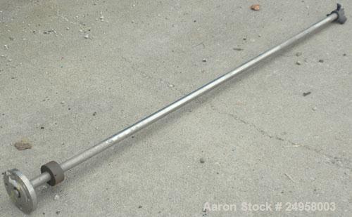 Used Agitator Shaft, 316 Stainless Steel. 1'' Diameter x 62-3/4'' long shaft with a 3'' diameter plastic impeller. 4-3/4'' O.D. (4) 1/2'' diameter hole mounting flange on approximate 2-5/8'' centers