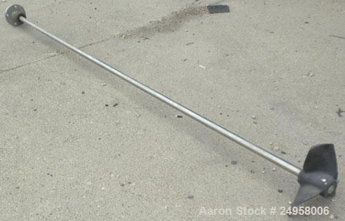 Used Agitator Shaft, 316 Stainless Steel. 1" Diameter x 83" long shaft with a 10" diameter plastic impeller. 4-3/4" O.D. (4) 1/2" diameter hole mounting flange on approximate 2-5/8" centers