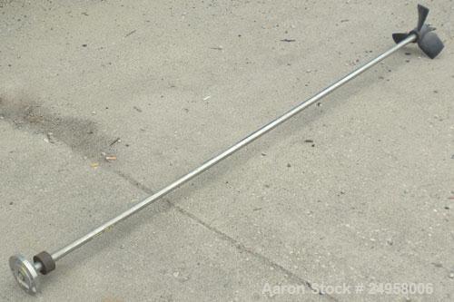 Used Agitator Shaft, 316 Stainless Steel. 1" Diameter x 83" long shaft with a 10" diameter plastic impeller. 4-3/4" O.D. (4) 1/2" diameter hole mounting flange on approximate 2-5/8" centers