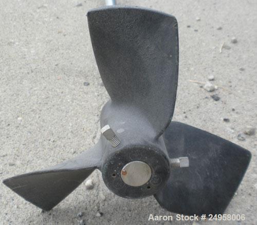 Used Agitator Shaft, 316 Stainless Steel. 1" Diameter x 83" long shaft with a 10" diameter plastic impeller. 4-3/4" O.D. (4) 1/2" diameter hole mounting flange on approximate 2-5/8" centers