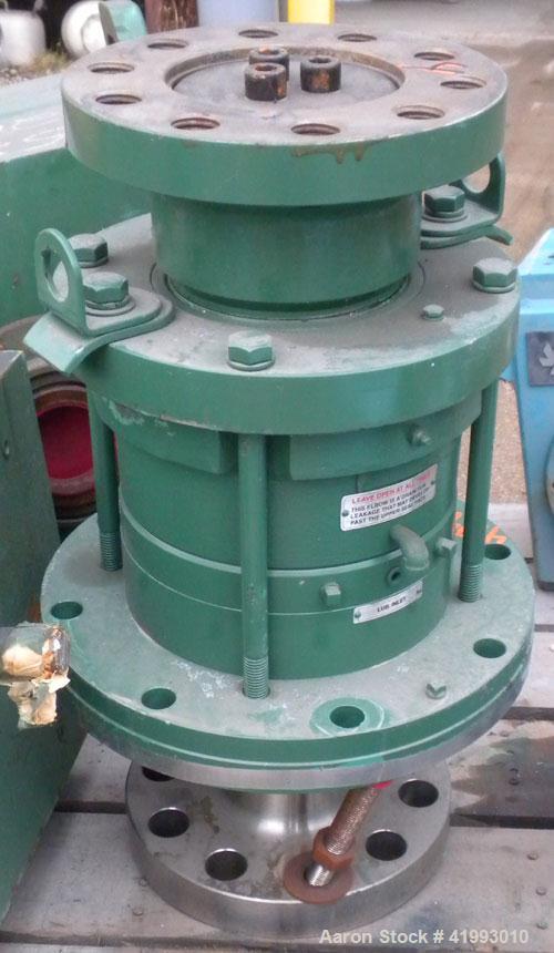 Used Lightnin Agitator Seal.Approximate 10" diameter flange with 2-3/4" bolt centers.