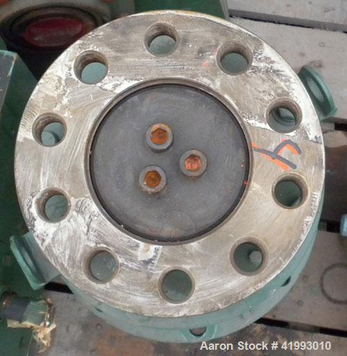 Used Lightnin Agitator Seal.Approximate 10" diameter flange with 2-3/4" bolt centers.