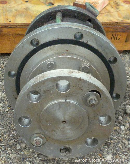 Used Lightnin Agitator Seal. Approximate 8 1/2" diameter flange with 2 1/2" bolt centers. Includes top lifting lugs.