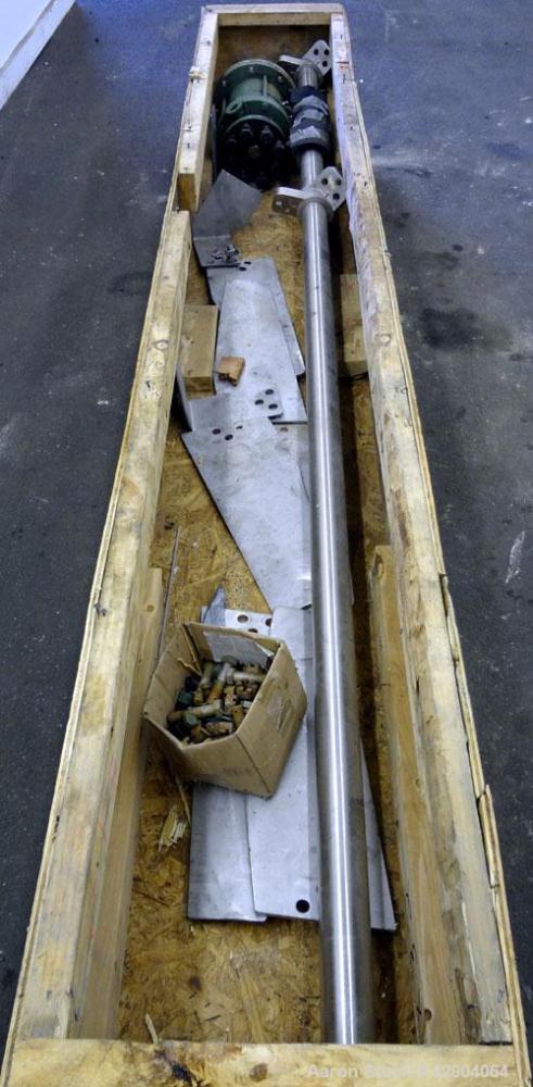 Used Lightnin Agitator Shaft, 316 Stainless Steel. Approximate 2-1/2" diameter x 114" long. (2) 3 Blade bolt on turbines. Approximate 6-1/4" Diameter 10 bolt hole mounting flange on approximate 1-3/4...