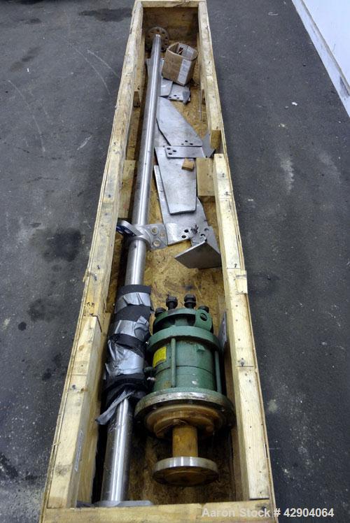 Used Lightnin Agitator Shaft, 316 Stainless Steel. Approximate 2-1/2" diameter x 114" long. (2) 3 Blade bolt on turbines. Approximate 6-1/4" Diameter 10 bolt hole mounting flange on approximate 1-3/4...