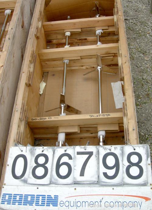 Unused- Lightnin Agitator Shaft, 316 Polished Stainless Steel. 1-1/4" diameter x 64" long shaft. Threaded mounting end. Includes (2) 3 blade turbines.