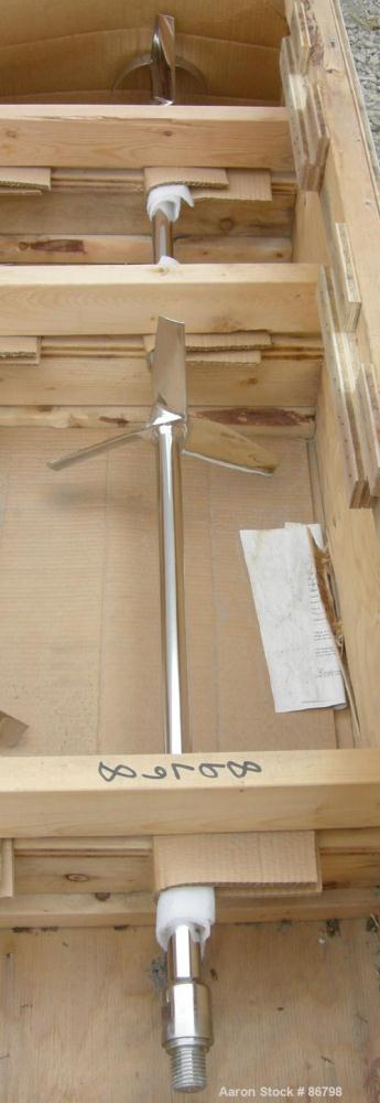 Unused- Lightnin Agitator Shaft, 316 Polished Stainless Steel. 1-1/4" diameter x 64" long shaft. Threaded mounting end. Includes (2) 3 blade turbines.
