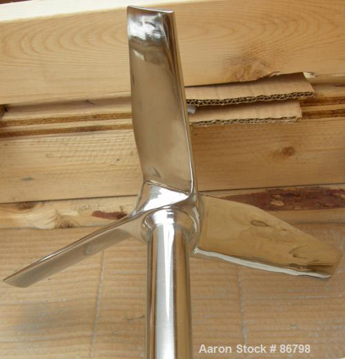 Unused- Lightnin Agitator Shaft, 316 Polished Stainless Steel. 1-1/4" diameter x 64" long shaft. Threaded mounting end. Includes (2) 3 blade turbines.