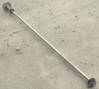 Used Agitator Shaft, 316 Stainless Steel. 1'' Diameter x 62-3/4'' long shaft with a 3'' diameter plastic impeller. 4-3/4'' O.D. (4) 1/2'' diameter hole mounting flange on approximate 2-5/8'' centers