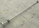 Used Agitator Shaft, 316 Stainless Steel. 1'' Diameter x 62-3/4'' long shaft with a 3'' diameter plastic impeller. 4-3/4'' O.D. (4) 1/2'' diameter hole mounting flange on approximate 2-5/8'' centers