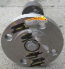Used Agitator Shaft, 316 Stainless Steel. 1'' Diameter x 62-3/4'' long shaft with a 3'' diameter plastic impeller. 4-3/4'' O.D. (4) 1/2'' diameter hole mounting flange on approximate 2-5/8'' centers