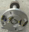 Used Agitator Shaft, 316 Stainless Steel. 1'' Diameter x 62-3/4'' long shaft with a 3'' diameter plastic impeller. 4-3/4'' O.D. (4) 1/2'' diameter hole mounting flange on approximate 2-5/8'' centers