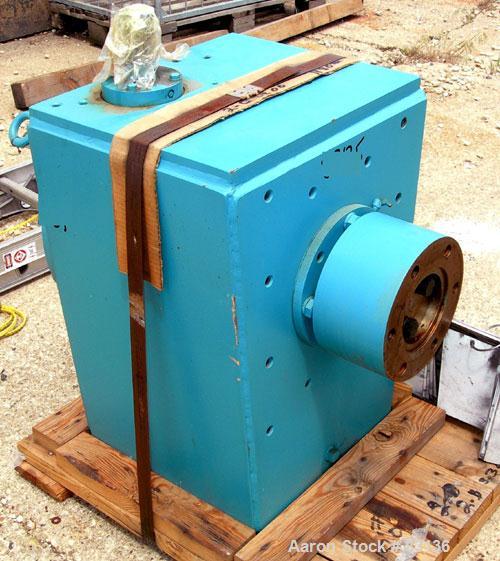 Used Chemineer Agitator Gearbox Only, Model 6HTM15. Input rpm 900, output rpm 30. Approximate 9-3/8" OD carbon steel shaft mounting ring with (6) approximate 3/4" threaded holes on 4" centers. Unit r...