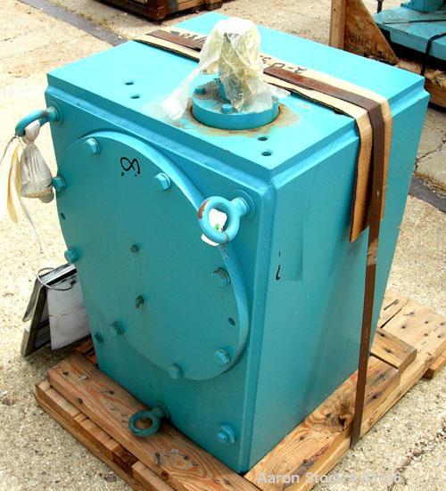 Used Chemineer Agitator Gearbox Only, Model 6HTM15. Input rpm 900, output rpm 30. Approximate 9-3/8" OD carbon steel shaft mounting ring with (6) approximate 3/4" threaded holes on 4" centers. Unit r...