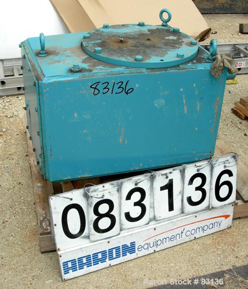 Used Chemineer Agitator Gearbox Only, Model 6HTM15. Input rpm 900, output rpm 30. Approximate 9-3/8" OD carbon steel shaft mounting ring with (6) approximate 3/4" threaded holes on 4" centers. Unit r...