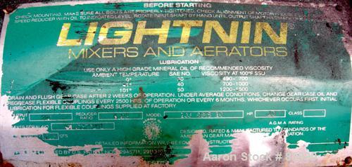 Used Lightnin Side Entering Agitator, Model 108-RSES-10. Ratio 6.23:1, output rpm 280. Driven by a 10 hp, 3/60/230/460 volt, 1735 rpm motor.