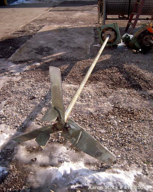 Used Lightnin Top Entering Agitator, Model 15-S-3. Ratio 14 to 1, 84 output rpm. 2" diameter x 120" long 316 stainless steel shaft with an approximate 32'' diameter 316 stainless steel 3 blade turbin...