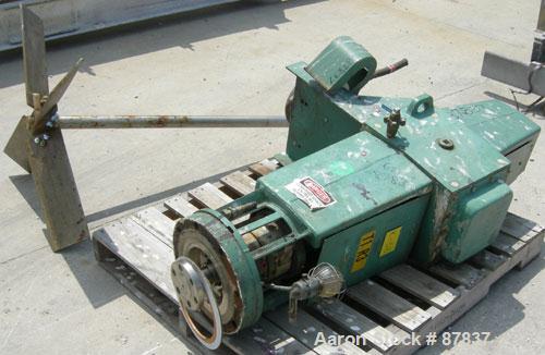 Used Lightnin agitator, model 82S5MX, ratio 21.1, output 84 rpm. 2" diameter 316 stainless steel shaft with a 32" diameter span 316 stainless steel 4 blade turbine, driven by a 5 hp, 3/60/230/460 vol...