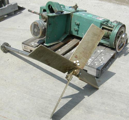 Used Lightnin agitator, model 82S5MX, ratio 21.1, output 84 rpm. 2" diameter 316 stainless steel shaft with a 32" diameter span 316 stainless steel 4 blade turbine, driven by a 5 hp, 3/60/230/460 vol...