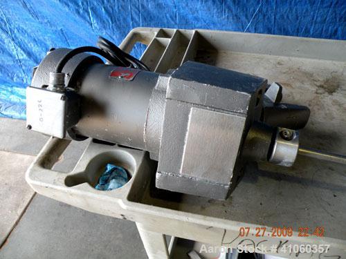 Used Lightnin Clamp-On Agitator, Model ND-1. 5/8" diameter x 50" long 304 stainless steel shaft with a 9" diameter 316 stainless steel 3 blade prop. Driven by a 1/3 hp, 1/60/115 volt, 1725 rpm motor.