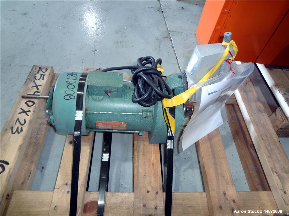 Used Lightnin agitator, Model NS-1. Approximately 1/2" diameter shaft with a 3 blade turbine, driven by a 0.33 hp, 1/60/115 volt, 1725 rpm motor. Clamp on. Serial #7902195.