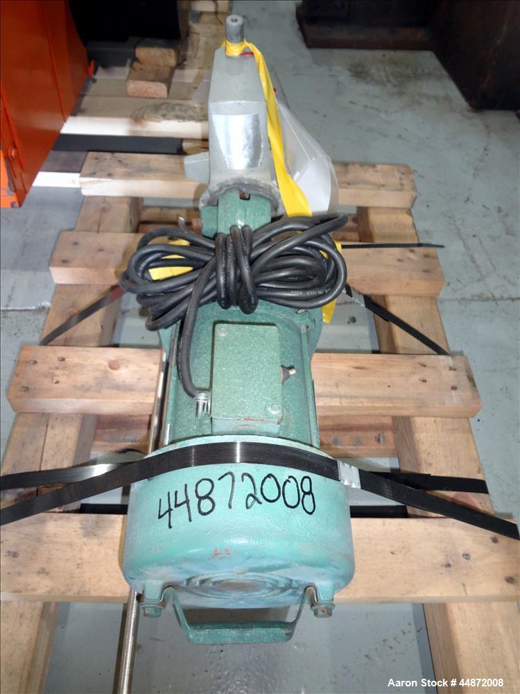 Used Lightnin agitator, Model NS-1. Approximately 1/2" diameter shaft with a 3 blade turbine, driven by a 0.33 hp, 1/60/115 volt, 1725 rpm motor. Clamp on. Serial #7902195.