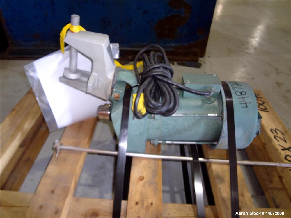Used Lightnin agitator, Model NS-1. Approximately 1/2" diameter shaft with a 3 blade turbine, driven by a 0.33 hp, 1/60/115 volt, 1725 rpm motor. Clamp on. Serial #7902195.