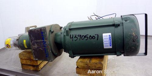 Used Lightnin Clamp-On Agitator, Model X1P300.  Clockwise rotation, shaft speed 1725 rpm.  Set up for a 1" diameter shaft (not included).  Driven by a 3 hp, 3/60 to 90 hz, 230/460 volt, 1760 rpm XP i...