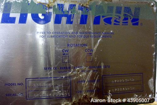 Used Lightnin Clamp-On Agitator, Model X1P300.  Clockwise rotation, shaft speed 1725 rpm.  Set up for a 1" diameter shaft (not included).  Driven by a 3 hp, 3/60 to 90 hz, 230/460 volt, 1760 rpm XP i...