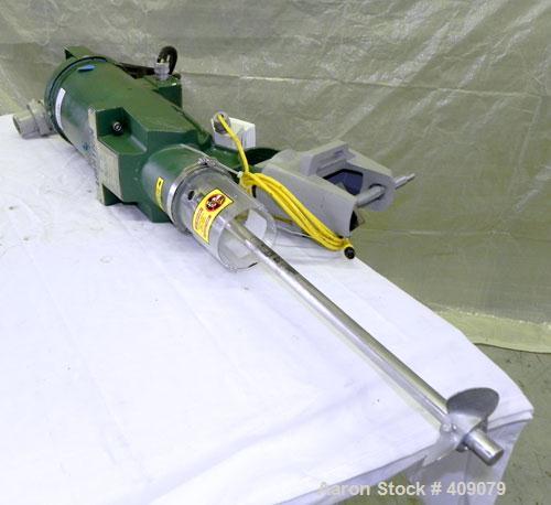 Used Lightnin Clamp-On Agitator, Model X1P33.  1-1/2" Diameter x 18" long 316 stainless steel shaft with a 3 blade prop.  Driven by a 1/2 hp, 3/60/230/460 volt, 1725 rpm motor.  Includes a Lightnin i...