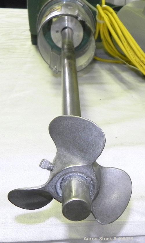 Used Lightnin Clamp-On Agitator, Model X1P33.  1-1/2" Diameter x 18" long 316 stainless steel shaft with a 3 blade prop.  Driven by a 1/2 hp, 3/60/230/460 volt, 1725 rpm motor.  Includes a Lightnin i...
