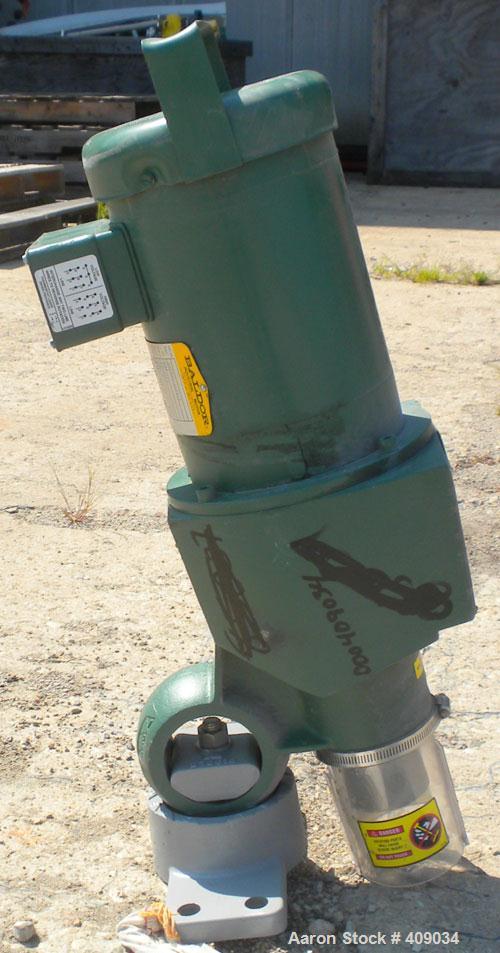 Used Lightnin Top Entering Agitator, Model X5P75. Cup plate mounting. Driven by a 3/4hp, 3/60/230/460 volt, 1725 rpm motor. Set fo clockwise rotation, requires shaft.