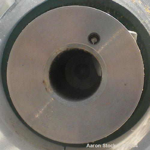 Used Lightnin Top Entering Agitator, Model X5P75. Cup plate mounting. Driven by a 3/4hp, 3/60/230/460 volt, 1725 rpm motor. Set fo clockwise rotation, requires shaft.