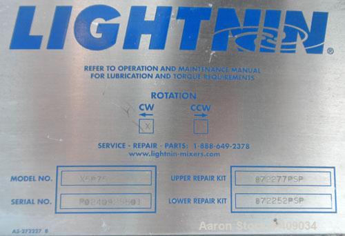 Used Lightnin Top Entering Agitator, Model X5P75. Cup plate mounting. Driven by a 3/4hp, 3/60/230/460 volt, 1725 rpm motor. Set fo clockwise rotation, requires shaft.