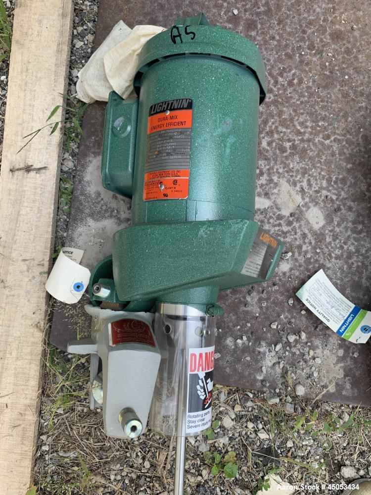 Unused- Lightnin Agitator, Model Xd-30. Approximate 1/2" diameter x 32" long stainless steel shaft, no blade. Driven by 0.30hp, 3/60/50/208-220/440 volt, 1725/1450 rpm motor. Serial# 95/31930-03.