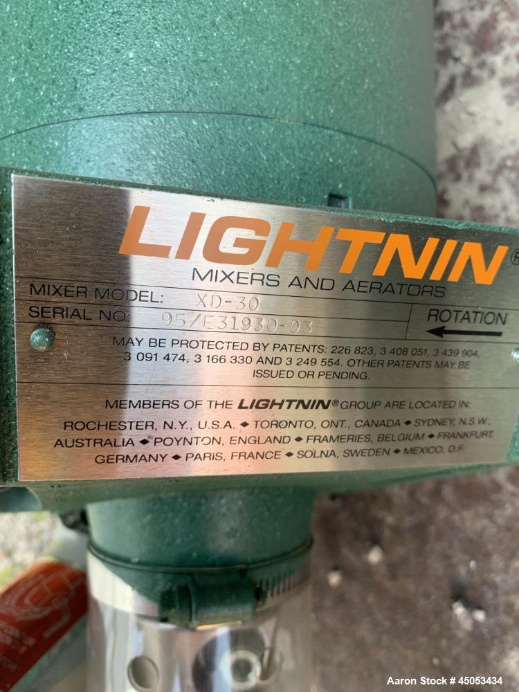 Unused- Lightnin Agitator, Model Xd-30. Approximate 1/2" diameter x 32" long stainless steel shaft, no blade. Driven by 0.30hp, 3/60/50/208-220/440 volt, 1725/1450 rpm motor. Serial# 95/31930-03.