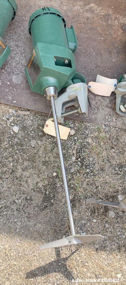 Unused- Lightnin Agitator, Model XJ-30. Approximate 5/8" diameter x 24" long stainless steel shaft with 3-blade turbine. Driven by 0.30hp, 3/60/50/208-220/440 volt, 1725/1450 rpm motor. Serial# 95/31...