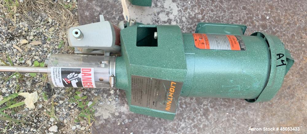 Unused- Lightnin Agitator, Model XJ-30. Approximate 5/8" diameter x 24" long stainless steel shaft with 3-blade turbine. Driven by 0.30hp, 3/60/50/208-220/440 volt, 1725/1450 rpm motor. Serial# 95/31...