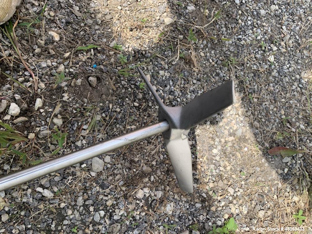 Unused- Lightnin Agitator, Model XJ-30. Approximate 5/8" diameter x 24" long stainless steel shaft with 3-blade turbine. Driven by 0.30hp, 3/60/50/208-220/440 volt, 1725/1450 rpm motor. Serial# 95/31...