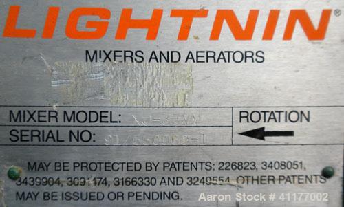 Used- Lightnin Top Entering Agitator, Model XJ-33VM. 1/2" diameter shaft x 27" long, 316 stainless steel shaft with a 7" dia...