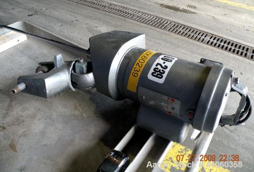 Used Lightnin Clamp-On Agitator, Model XJ-43. 5/8" diameter x 47-1/2" long 316 stainless steel shaft with a 9" diameter 316 stainless steel 3 blade prop. Driven by a 0.43 hp, 1/60/115/230 volt, 1725/...