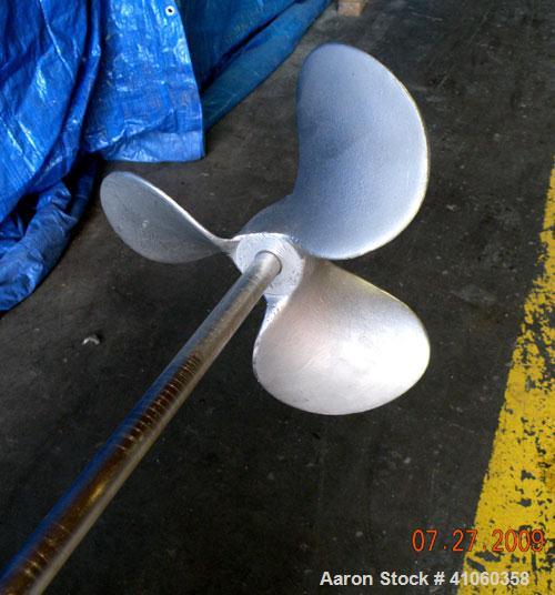 Used Lightnin Clamp-On Agitator, Model XJ-43. 5/8" diameter x 47-1/2" long 316 stainless steel shaft with a 9" diameter 316 stainless steel 3 blade prop. Driven by a 0.43 hp, 1/60/115/230 volt, 1725/...