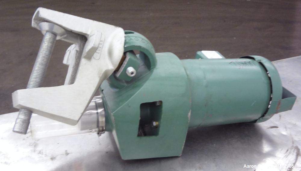 Used Lightnin Clamp-On Agitator, Model XJ-65.  0.65 Hp, 1/60/230/460 volt, 1740 rpm motor.  Requires an approximately 5/8" diameter shaft.