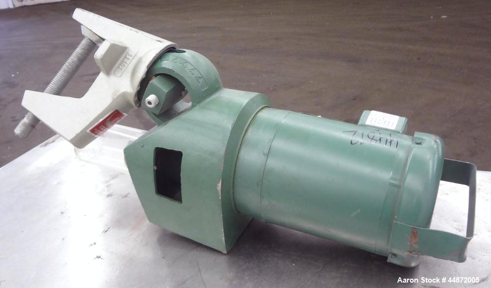 Used Lightnin Clamp-On Agitator, Model XJ-65.  0.65 Hp, 1/60/230/460 volt, 1740 rpm motor.  Requires an approximately 5/8" diameter shaft.